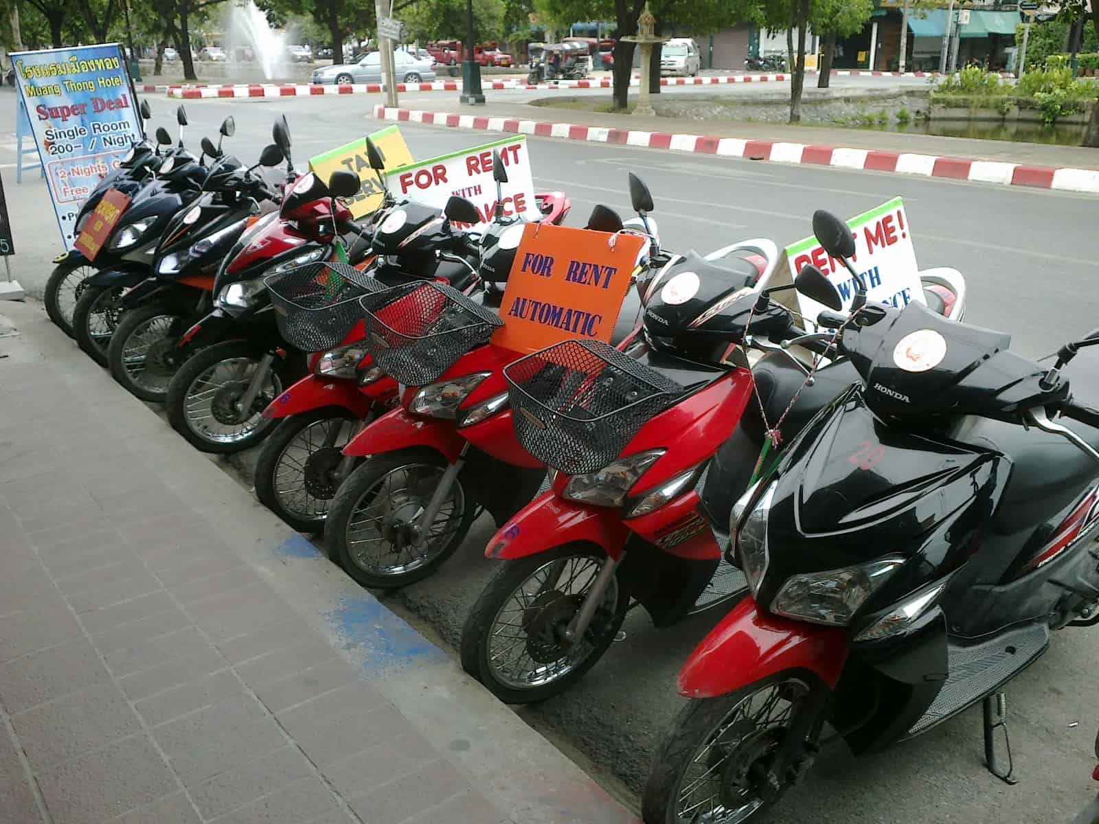 Scooter selection at a scooter rental shop in Chiang Mai, Thailand.